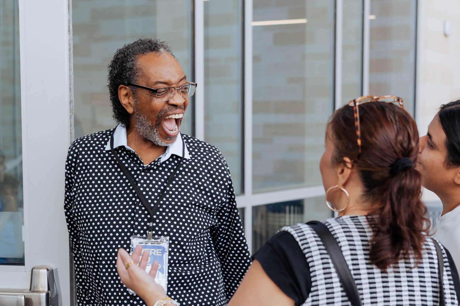 Church members laughing together outside Movement Church